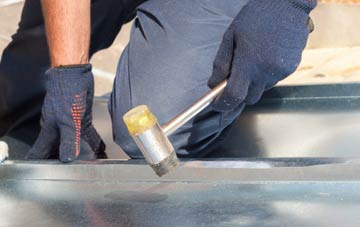Stanton In Peak metal flat roofing repairs